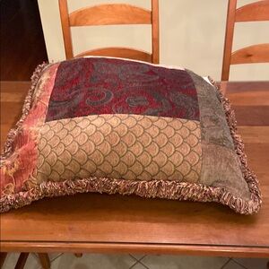 Luxurious Patchwork Accent Pillow with Fringe.